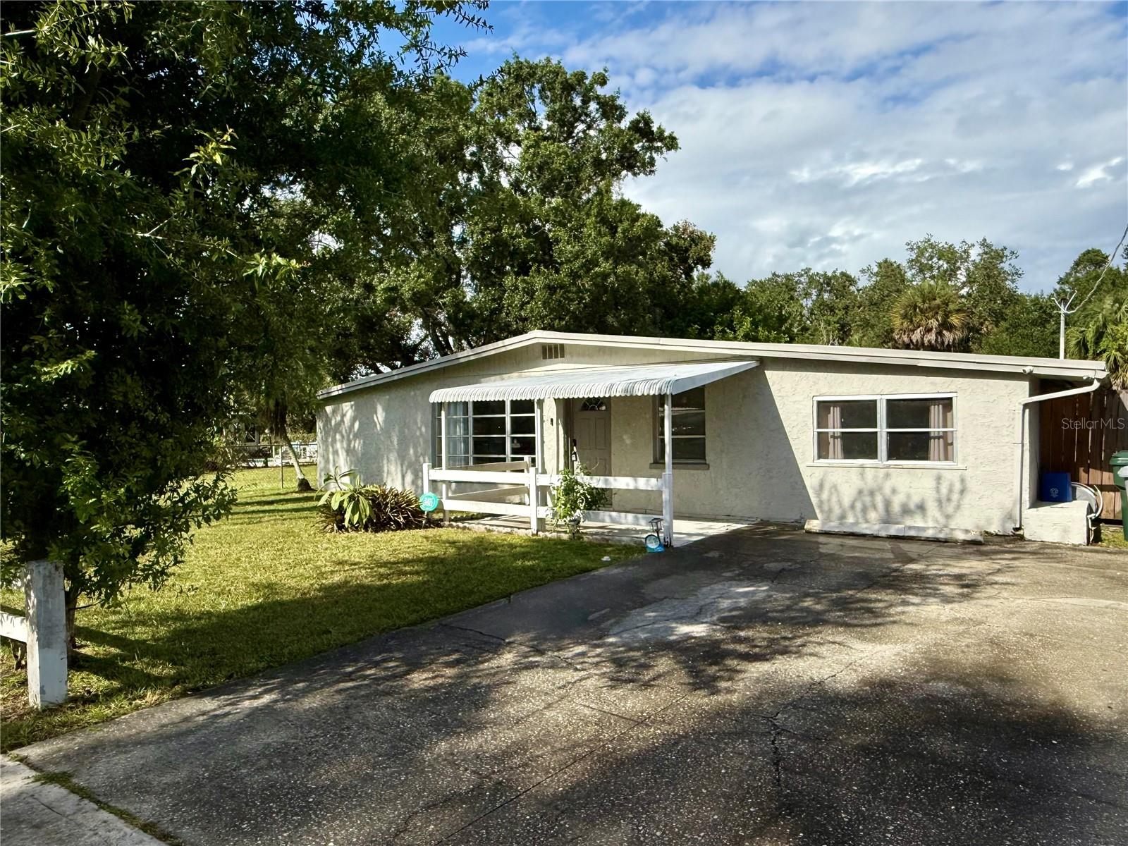 Welcome to your new Home! This super cute home boasts 3 bedrooms, 2 bathrooms, an open concept completed with a modern updates. The beautiful open floor plan maes the space feel even larger than it already is. The open kitchen with the 4 seat breakfast bar opens up to a spacious living room that features a wood burning fireplace. Both the living room and family room coushes are avaiable to renters as well or can be removed if you have your own! The separate family room provides that extra space where you can break away or create a game room, formal dining, etc. The interior laundry room is a spacious and leads out into your new outdoor oasis complete with a swimming pool and a 12 x 32 foot pergola to provide shade to this massive back yard which has an 8 foot back gate which opens to a further private community park. This home is in the centrally located subdivision of Sarasota Springs. Only 7 Minutes to the Highway, 10 minutes to downtown, and within a 15-20 minute drive from the beaches. Shopping is right arounf the corner with Publix market, Gym, lots of shopping and restauruants. This home is ready now and perfectlly set up for anyone! Call today for your private showing! List agent is Owner!
