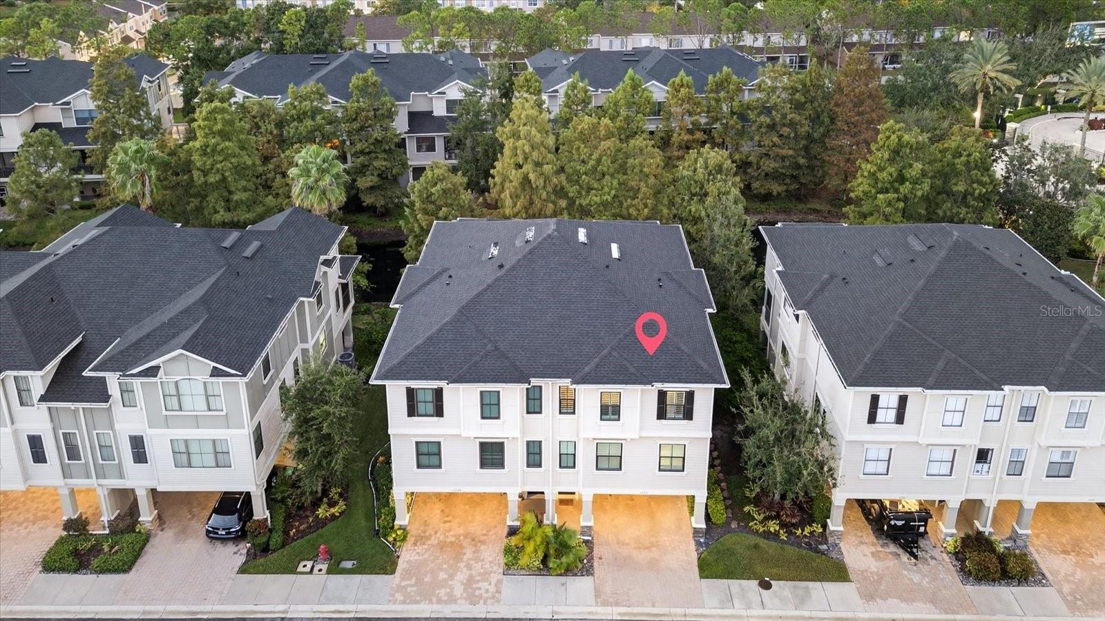 Introducing 6222 Anhinga Dr.: Comfort awaits you at this beautiful gated community in the heart of Tampa Bay. This well-maintained and updated three-story townhome brings spacious living to life. From the oversized two-stall garage, as you enter the home, you are sure to be impressed. Don’t do stairs? No problem. This home comes with its own ELEVATOR, allowing for the convenience of taking your groceries, luggage, and heavier items straight from your garage to exactly where you need to be. Moving to the main floor, a cohesive look is achieved throughout with new LVP Flooring installed in 2025. The kitchen, featuring granite countertops and stainless steel appliances, is perfect for entertaining guests. Making your way up to the third floor of this incredible home, you arrive at the primary bedroom that dreams are made of. The OVER-SIZED PRIMARY allows space to make it the perfect escape. Featuring a walk-in closet with plenty of room for storage and a primary bathroom equipped with a soaking tub, double vanity, and tile shower. What more could you ask for! Walking down the hallway, you will find your washer and dryer conveniently to the left, a full bath, and your other two spacious bedrooms. Take a breath of fresh air and enjoy your picturesque balcony overlooking the pond, or step outside to enjoy all the community's various amenities. Rest easy knowing the HOA covers all exterior maintenance, including roof replacement (2022), painting, lawn care, and pest control. Close to Tampa International Airport, Shopping, and More; you’re new home is calling. Other Updates Included NEW AC 2024 & SMART FEATURE THERMOSTAT 2025!