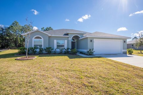 Photo of 91 Flemingwood Lane, Palm Coast, FL 32137 (MLS # FC315228)