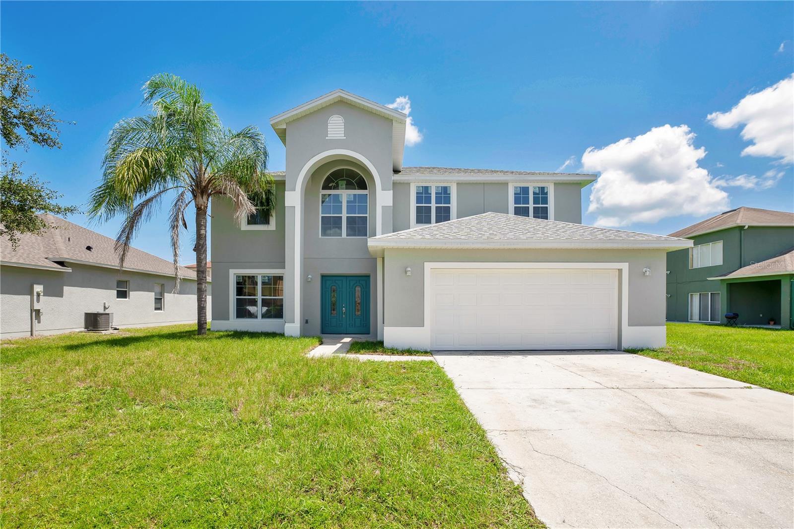 AMAZING 5 bedroom 4 bath home. COMPLETELY REBUILT; brand new EVERYTHING. The second floor hosts 4 bedrooms, 2 bathrooms and a loft. All closets are larger than the standard size or walk-in closets. This home has a spacious upstairs master bedroom with his and her closets. The master bath has a standing shower and separate jacuzzi tub with double sinks. 3 bedrooms share a bathroom with tub and double sinks.
Downstairs has 1 bedroom with an ensuite bath and walk-in closet, great for generational home use. Large separate laundry room on the first floor. All brand new stainless steel appliances to compliment the soft close cabinets and drawers with granite counter tops. An enormous walk-in pantry that is truly a dream. Open floor plan to host amazing gatherings. Family room, dining room, and kitchen are brightened with lots of natural light. Beautiful pendant lights over the island in the kitchen for more eating space. Gorgeous chandelier at the front entrance to wow your guests. Feel at ease when you come home to brand new lovely home. This lovely place is close to Disney, 10 mins from Publix and Walmart, and less than 5 mins from the Poinciana Parkway. Don't delay. Call to schedule your showing today. Matterport link available for full walk through. HOA is a low $83 a month which includes internet and cable.