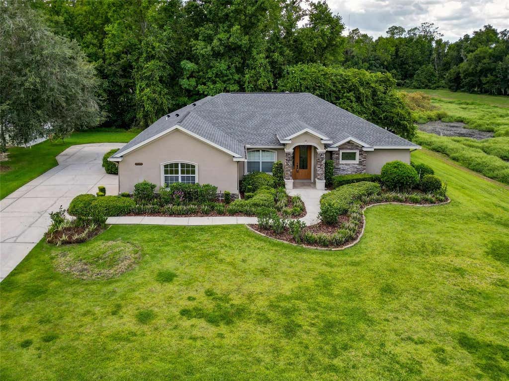 Photo of 10040 SE 42nd Court, Belleview, FL 34420 (MLS # OM730855)