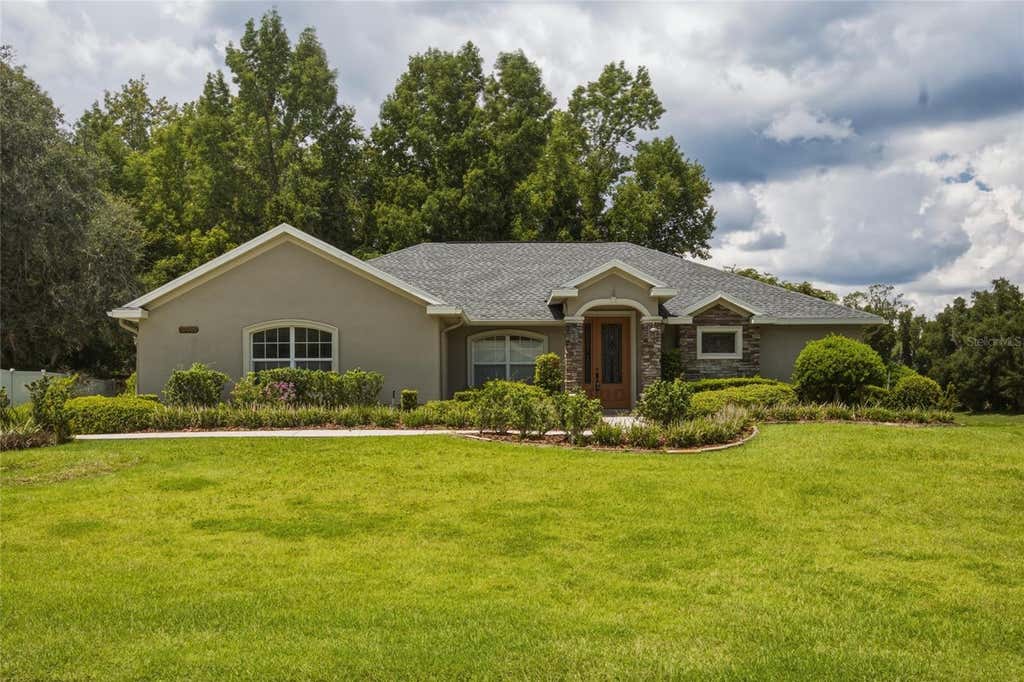 Photo of 10040 SE 42nd Court, Belleview, FL 34420 (MLS # OM730855)