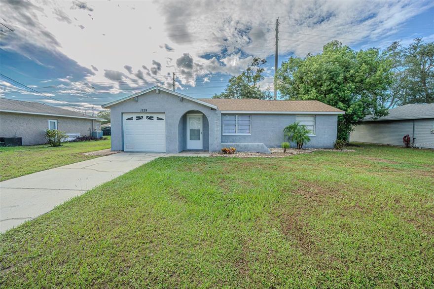 MOVE in READY home for LEASE is IMMEDIATELY Available!  You do not want to miss this charm-filled, updated 3-bedroom, 2-bathroom home, centrally located in Spring Hill.  Offering 1,230 square feet of heated living space and 1,560 square feet under roof, this split floor plan features an updated kitchen with new cabinets, stainless steel appliances, and tile flooring laid on a 45-degree angle for a unique and stylish touch.  Spacious Great room is OPEN to Dining area with sliding doors to BACK PATIO.  Lush backyard has room to roam!  One car garage with painted floor and door to kitchen.  The home has been well-maintained with numerous recent upgrades including a roof (2017), garage door (2017), detached shed (2018), irrigation system (2018), HVAC (2020), updated front door (2020).  Washer and Dryer convey and it’s move-in ready and perfectly suited for comfortable living, nestled in a residential neighborhood with easy access to shopping, schools, medical facilities and highways to commute to Orlando, Tampa, Airports and the Beaches!  This home is available UNFURNISHED and includes water, sewer, trash, and lawn care in the monthly lease.  First month’s rent, last month’s rent, and security deposit are required at lease signing.  One small pet under 20 lbs is welcome with owner approval.  Don’t miss this opportunity to lease a lovingly cared for home in a convenient and quiet Spring Hill location.  CALL TODAY!