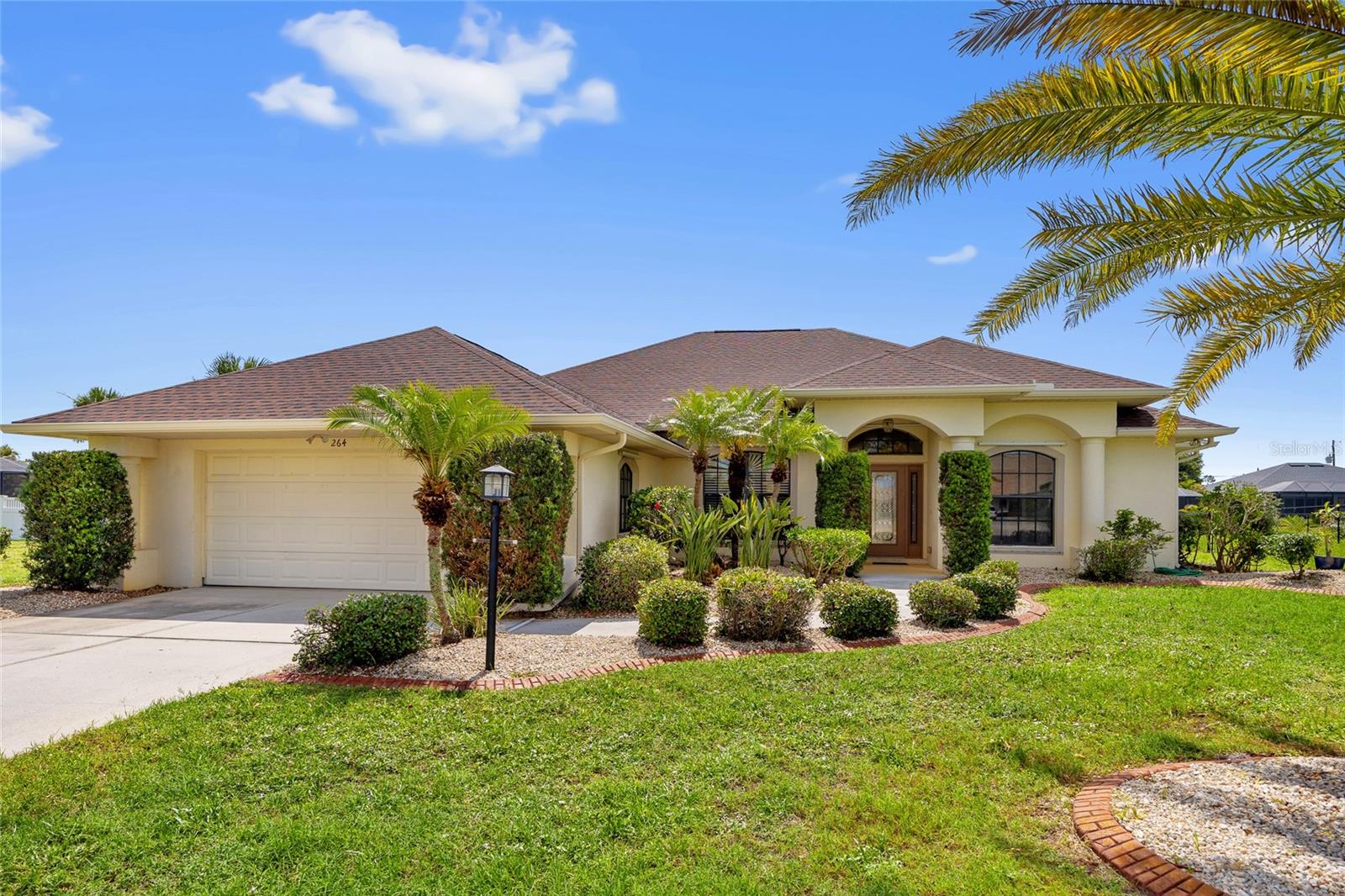 ROTONDA WEST! SPACIOUS 3 BEDROOM PLUS OFFICE, 2.5 BATH, 2-CAR GARAGE NEAR PRISTINE SWFL BEACHES AND NUMEROUS GOLF COURSES! Inviting open floor plan features over 2,715 square feet of living area, high ceilings, ample natural lighting, multiple sliders throughout and oversized 2-car garage. Step inside to a formal living area with hardwood flooring and views of the lanai and pool area. The kitchen features light cabinetry, granite countertops, & breakfast bar perfect for entertaining guests. Generous primary bedroom boasts a walk-in closet, access to pool and ensuite bath with garden tub, tile walk-in shower and dual sinks. Split floor plan provides guests with plenty of privacy including hall leading to 2 additional bedrooms with full guest bath. Outside entertaining area features covered lanai, screened pool and outdoor half bath. Rotonda West is a highly desirable community, and this home won't last long! You'll find world-class fishing at Boca Grande, numerous golf courses close by, sandy beaches, boating and a wide variety of dining and shopping! Don't miss this opportunity! Schedule your private showing today!