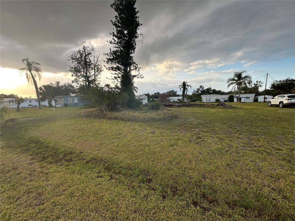 Photo of 35791 Washington Loop Road, Punta Gorda, FL 33982 (MLS # C7509610)