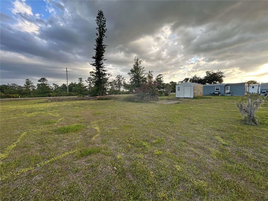 Photo of 35791 Washington Loop Road, Punta Gorda, FL 33982 (MLS # C7509610)