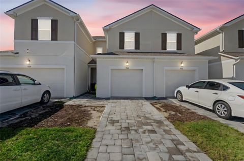 Photo of 866 Spring Palms Loop, Orlando, FL 32828 (MLS # O6357770)