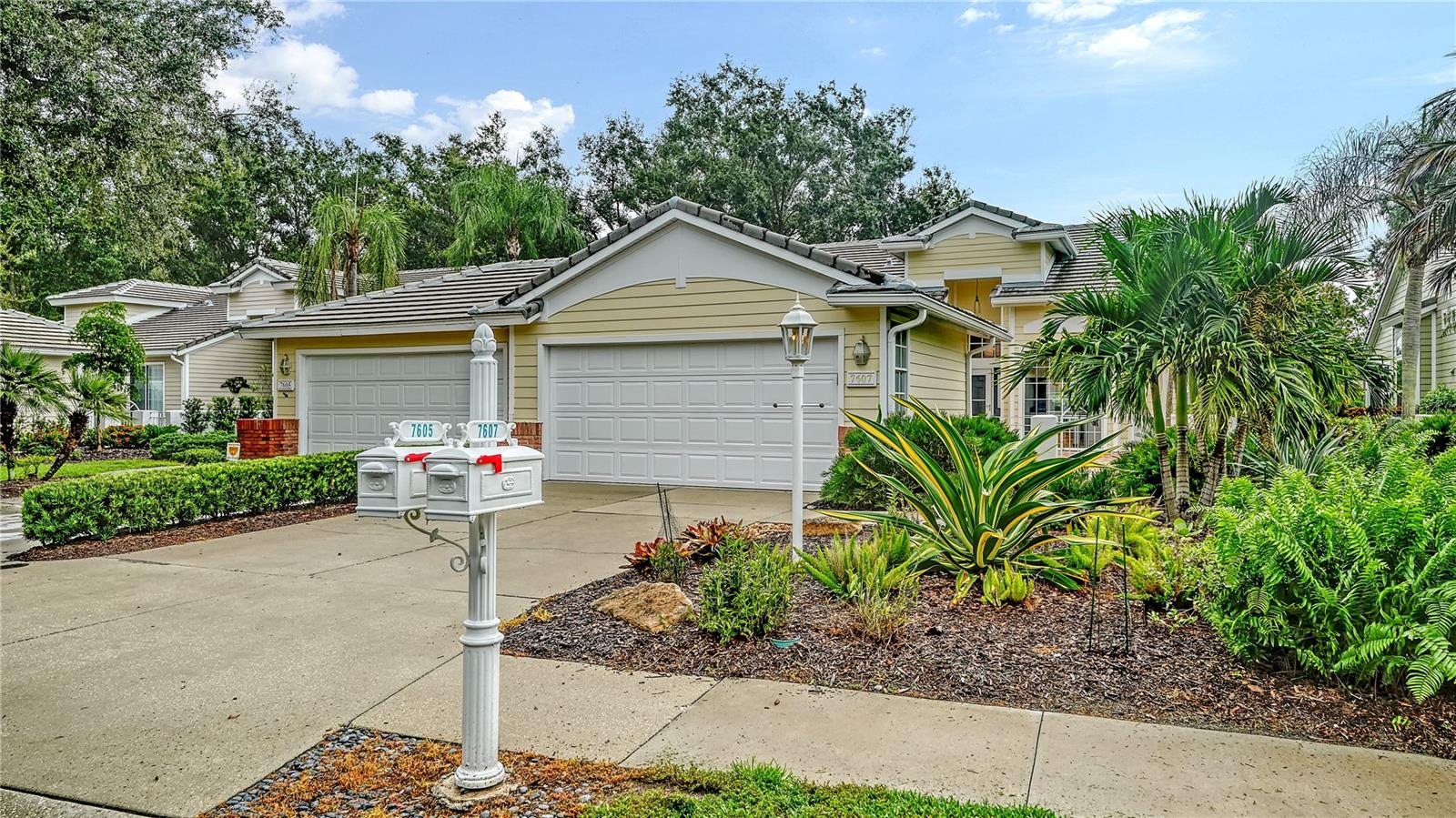 This beautifully MOVE IN READY updated and meticulously maintained Duplex with spacious two car garage in the desirable Whitebridge neighborhood of University Park offers a peaceful setting with tranquil golf course views. Lots of Upgrades -- No Carpet. A private courtyard welcomes you into the home, creating the perfect spot for greeting guests or enjoying a quiet retreat outdoors. Inside, the open floor plan is filled with natural light, highlighted by volume ceilings and elegant plank tile ceramic tile floors throughout. The updated kitchen is a chef’s delight with granite countertops, stylish light cabinetry, and a sleek induction range, all opening to the spacious living and dining area, perfect for both everyday living and entertaining. Directly off the living room, the recently enclosed lanai with hurricane resistant doors and windows provides additional living space and overlooks lush, professionally designed landscaping—an ideal spot for your morning coffee or unwinding with a good book. The master suite is generous in size, featuring vaulted ceilings, a large window, spacious walk-in closet, dual-sink vanity, and walk-in shower. A split-plan layout offers privacy for guests, with a separate bedroom and bath along with a conveniently located laundry area. Thoughtful owner updates include a courtyard updated with recently sealed pavers, enclosed lanai, Dragonfly landscaping, Climate Design Trane A/C system 2023, 19-inches of attic insulation, updated electrical panel and wiring, cellular blinds throughout, and new induction range, microwave, refrigerator and dryer. The roof was replaced in 2018, ensuring peace of mind for years to come.
Whitebridge Court is a maintenance-free community offering its own heated pool and a welcoming social environment. Conveniently located near the clubhouse, residents enjoy easy access to University Park Country Club’s resort-style amenities, including 27 holes of championship golf, premium tennis courts, pickleball, croquet, fitness center, social events, and dining at The Park Grill & Café (minimum social membership required).Located just minutes from downtown Sarasota, SRQ International Airport, shopping, dining, beaches, and cultural attractions, this Duplex combines modern updates, timeless style, and a premier location for the ultimate Florida lifestyle.
Furniture available under separate contract. Personal art excluded. Inventory list will be provided. Improvement expenditures of $60,417.
Attachment included. Outdoor furniture is in storage in garage.
Please Submit on FAR BAR contract with proof of funds.