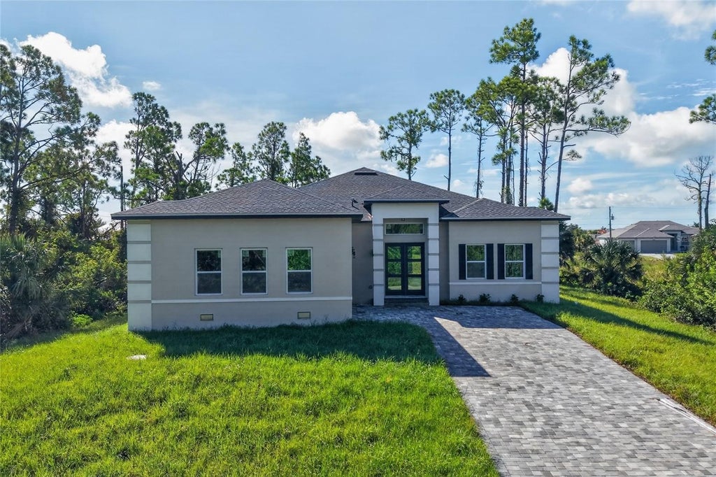 Photo of 14511 Argus Lane, Port Charlotte, FL 33981 (MLS # O6439321)