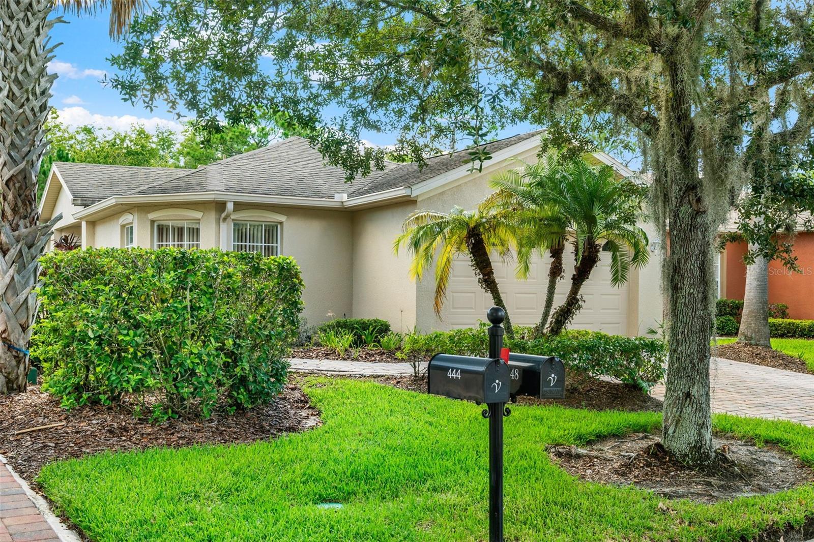 Welcome home to sought after Solivita! This luxury, 55+ resort-style subdivision has everything! From its guard-gated entrance, 14 heated pools, Fiber Optic internet, two full golf courses, two state-of-the-art fitness centers, amenity complexes, neighborhood centers, pickleball, tennis, bocce, shuffleboard courts, and over 200 Clubs (with Art, Education and cultural classes) along with miles of walking and bike paths, you will have plenty to enjoy! You will love this beautifully appointed Hemingway model home backing onto a spectacular conservation area and NO REAR NEIGHBORS! This home has amazing curb appeal and boasts paid off solar panels installed in 2023! As you enter the ornamental front door, you will appreciate and love entertaining in the the expansive family/dining room, which includes beautiful 12' ceilings! The kitchen is open to entertaining and complete with plenty of countertops and 42" cabinets, dining nook, and appliances. The home boasts of a split floor plan so you can retreat to the oversized primary suite with stunning views. The ensuite bathroom is complete with a vanity area, and lavish shower. You will appreciate the second bedroom and full bath! Work from home in your private office with double doors which can also be used as a flex space. Step outside to the oversized screened in covered lanai and enjoy the privacy of a serenely peaceful backyard overlooking the beautiful conservation area. You'll love every moment of it. You'll also appreciate the recently replaced AC and water heater, the separate laundry room and garage with room for a car and a golf cart. Nearby Solivita you will find plenty of shopping, restaurants, and medical facilities. You are just minutes from the theme parks using the expressway. Come live the Solivita Lifestyle!