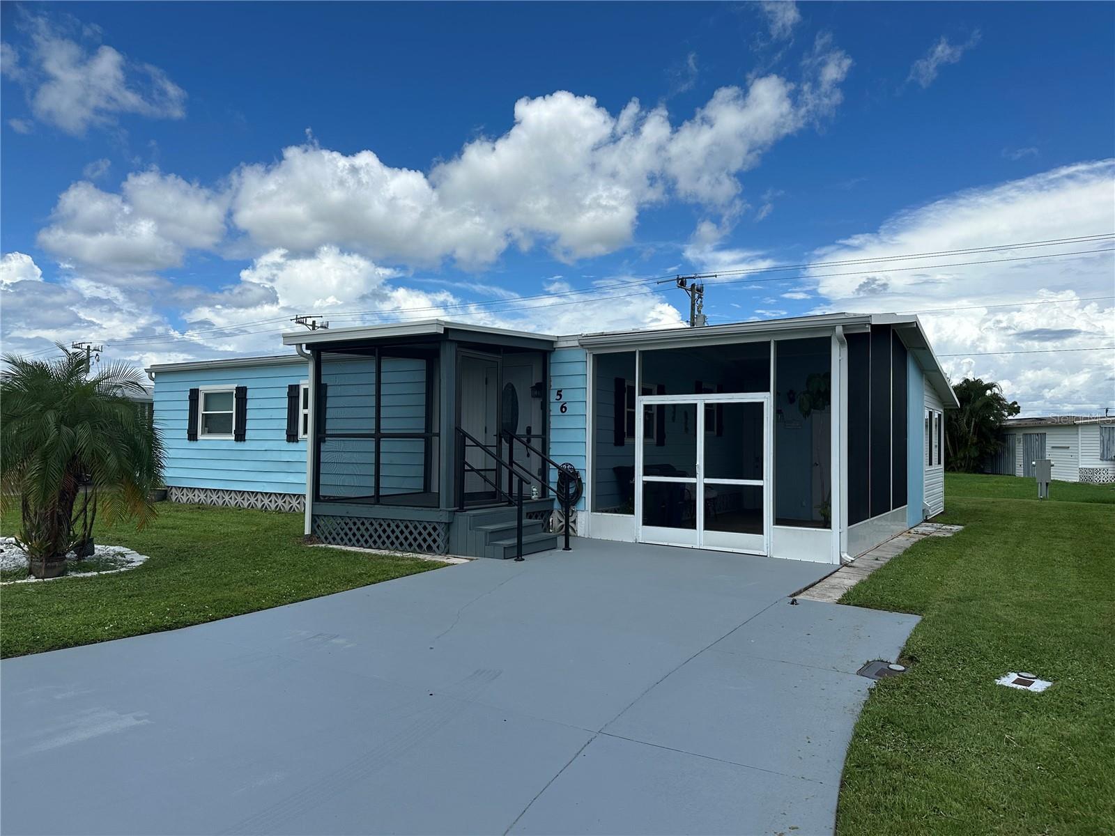 Welcome to Harbor Isles, one of Venice’s most desirable waterfront communities! This charming and beautifully updated manufactured home offers the perfect blend of comfort, functionality, and Florida charm. The spacious primary bedroom is a true retreat, featuring a large walk-in closet and a private en-suite bath. A well-sized second bedroom also includes its own walk-in closet, with a full guest bath conveniently located in the hall. The home boasts a bright and open dining room, ideal for entertaining or casual meals. The updated kitchen features stainless steel appliances, and multiple living spaces include a large Florida room, a screened front porch with distant lake views, a second screened sitting porch, and a small, private open-air patio in the rear. Located just minutes from Gulf beaches, shopping, dining, and with access to Harbor Isles’ resort-style amenities, this home is move-in ready and waiting for you!