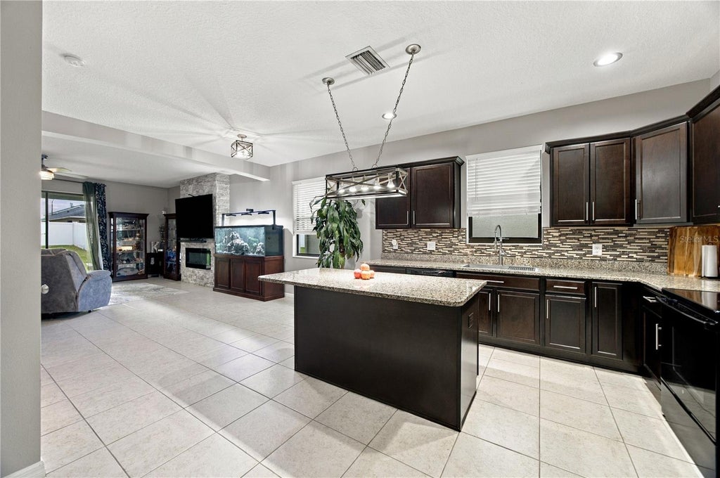 Photo of 837 Old Windsor Way, Spring Hill, FL 34609 (MLS # TB8555200)
