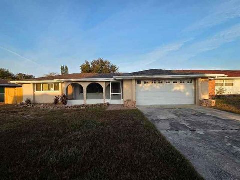 Photo of 7619 Summertree Lane, New Port Richey, FL 34653 (MLS # TB8456783)
