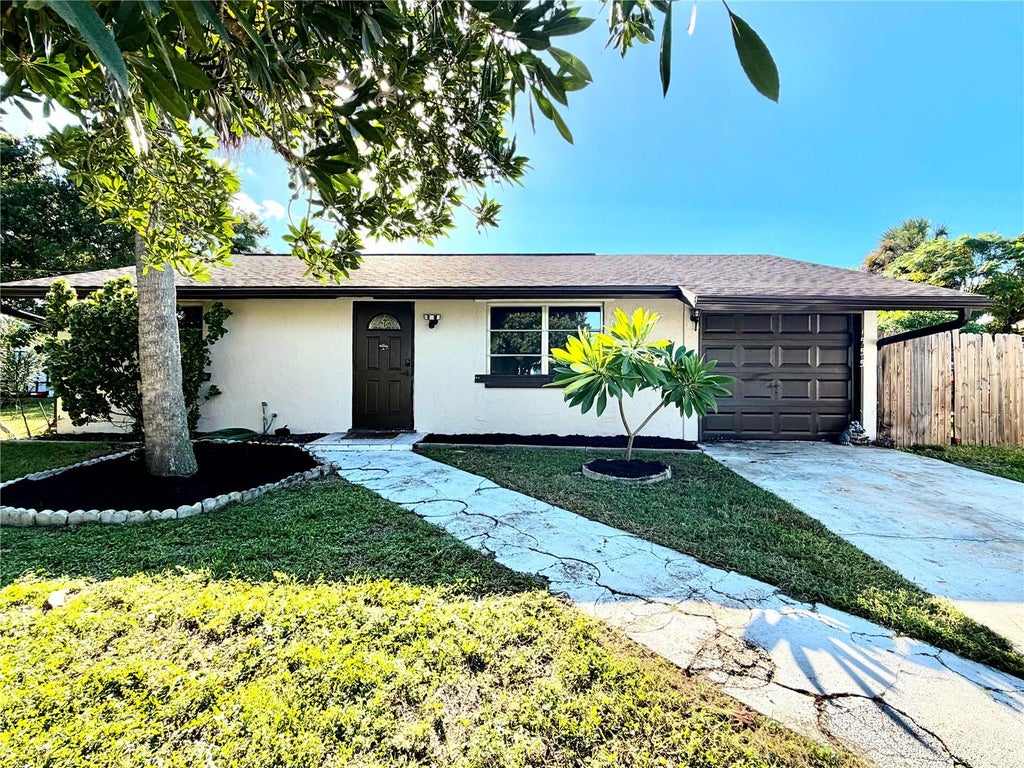 Photo of 1555 Beacon Drive, Port Charlotte, FL 33952 (MLS # C7530869)