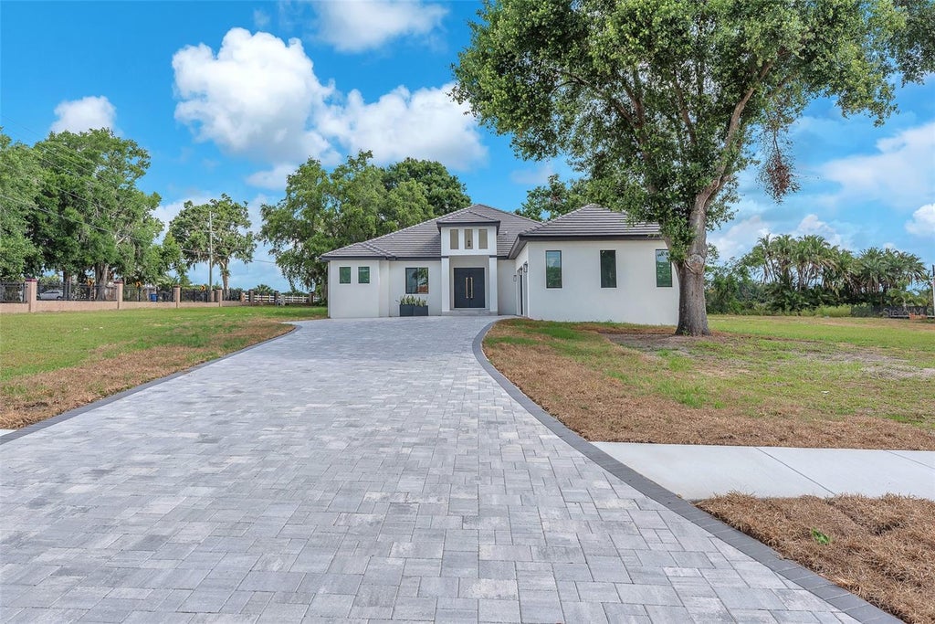 Photo of 11921 Fort King Highway, Thonotosassa, FL 33592 (MLS # TB8543251)