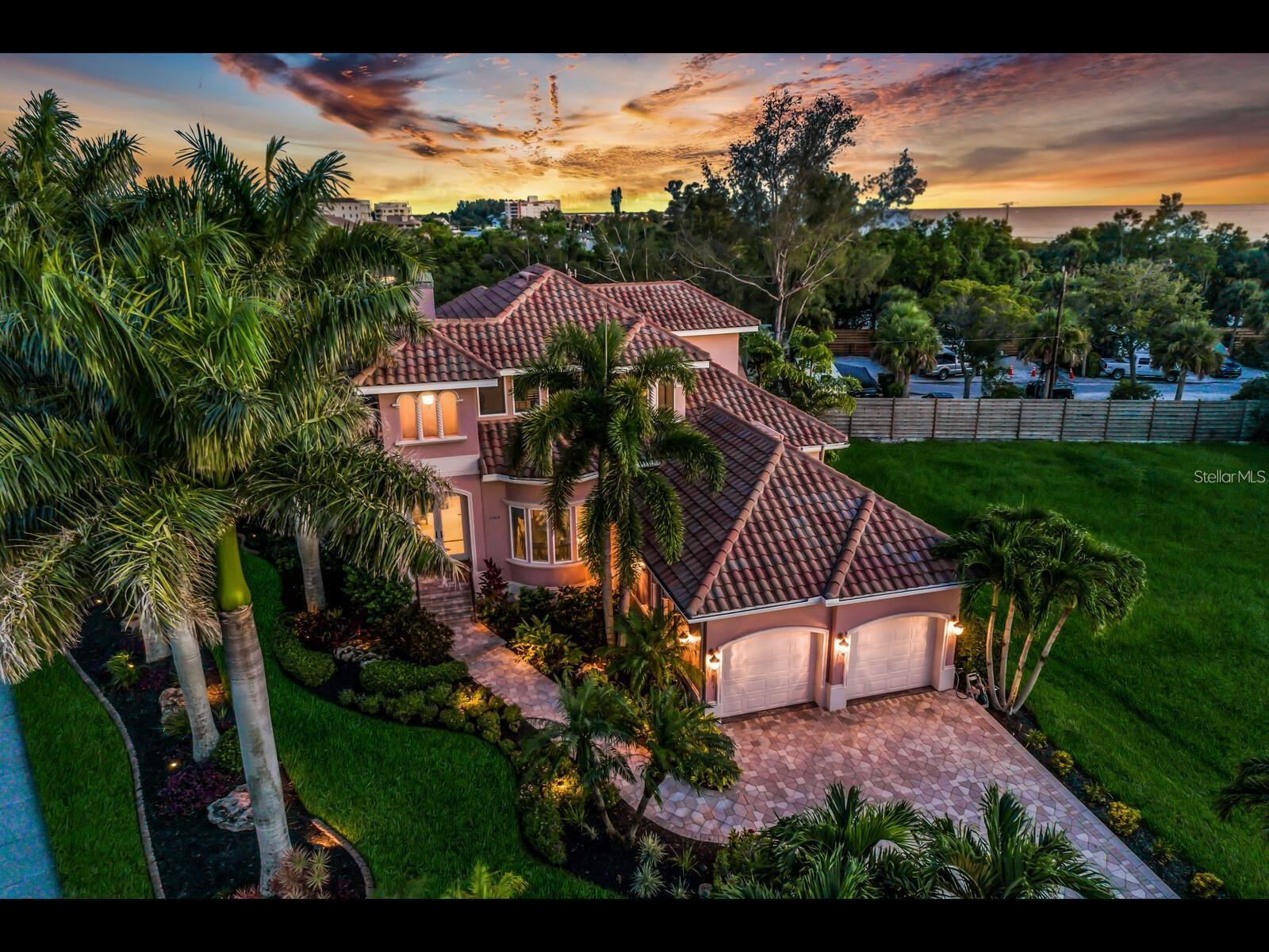 Don't miss this spectacular custom Italian-designed four-bedroom, three-bathroom home for rent! Located in the beautiful, quiet, and highly sought-after Tortoise Estates. The home comes with deeded access directly to the beach and sparkling gulf waters. It is only steps from the marina, boat dock, and kayaking. It is a short bike or trolley ride to the heart of Siesta Village, with all the best shopping, restaurants, and entertainment! This home has been meticulously maintained, with no luxury spared. The kitchen features a large island with custom wood cabinetry, granite countertops, 6 burner natural gas stove, plus a gas fireplace bookended by the living room and eat-in kitchen. There are multiple disappearing sliders, that showcase the magnificent pool and a jetted hot tub spa. The pool features custom lighting, a fountain, and a waterfall. The home boasts a surround sound system on the first floor with controls in each room, three AC systems, and a central vacuum. A spacious first-floor master suite offers a jacuzzi tub, walk-in shower with massage heads, two generous walk-in closets, and direct pool access. Also, on the first floor is an executive office, guest bedroom, full bath, and spacious laundry room. Upstairs you will find a full bath with two additional large bedrooms, one with a private balcony. This gorgeous home will not last long, schedule your private showing today.