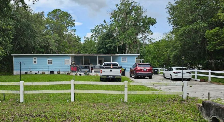 WOW - wonderful opportunity for extended family or 2 unit rental property.  Main unit is 3/2 952 square feet, and separate unit is open concept 2/1 approximately 700 square feet.  Move-in ready!  Main unit HVAC, Roof, water heater, well and septic are all less than 4 years old.  Located in serene Bithlo this property is 11 miles to the UCF campus and 18 miles to Titusville for those wanting to commute in either direction.  With no HOA fees and a fee simple title, this property surrounded by the quiet woods of Bithlo and the easy access to main venues, this one of a kind home is a must see - book your appointment now.