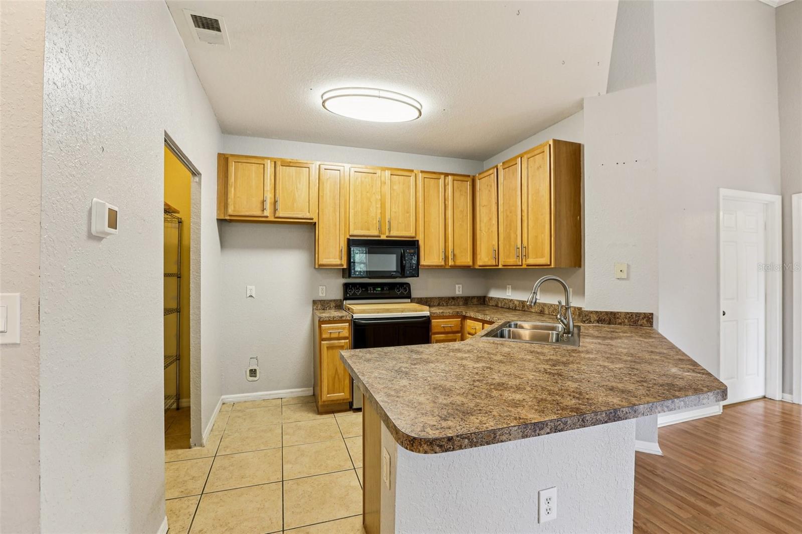 COURTNEY PALMS CONDO - Residential