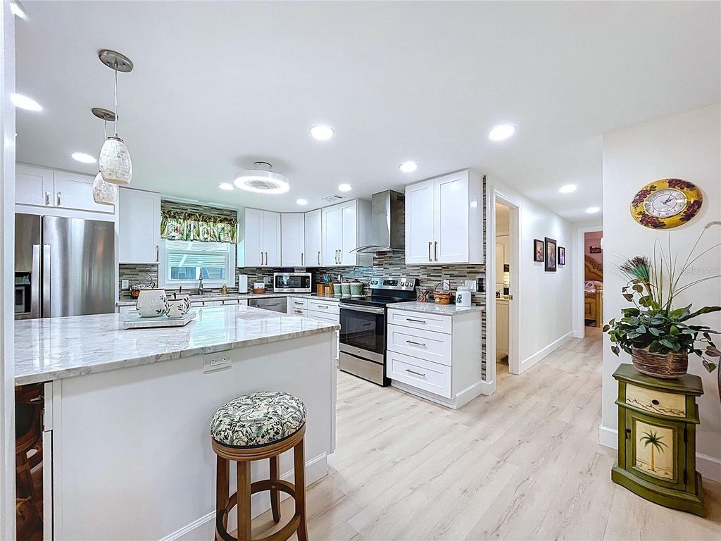 Photo of 98 Dolphin Drive N, Oldsmar, FL 34677 (MLS # TB8416477)