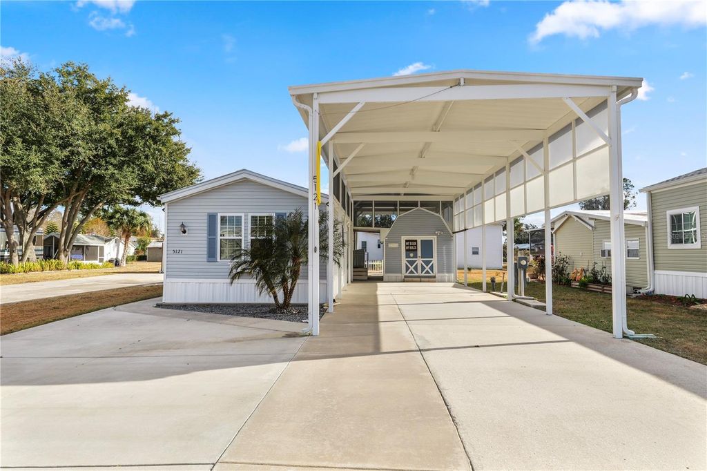 Photo of 5121 Shore Line Drive, Polk City, FL 33868 (MLS # L4959162)