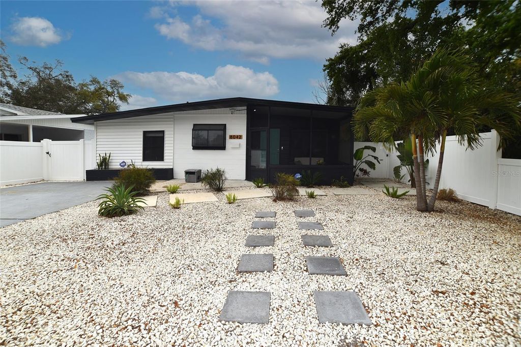 Photo of 8042 36th Avenue N, St Petersburg, FL 33710 (MLS # TB8481035)