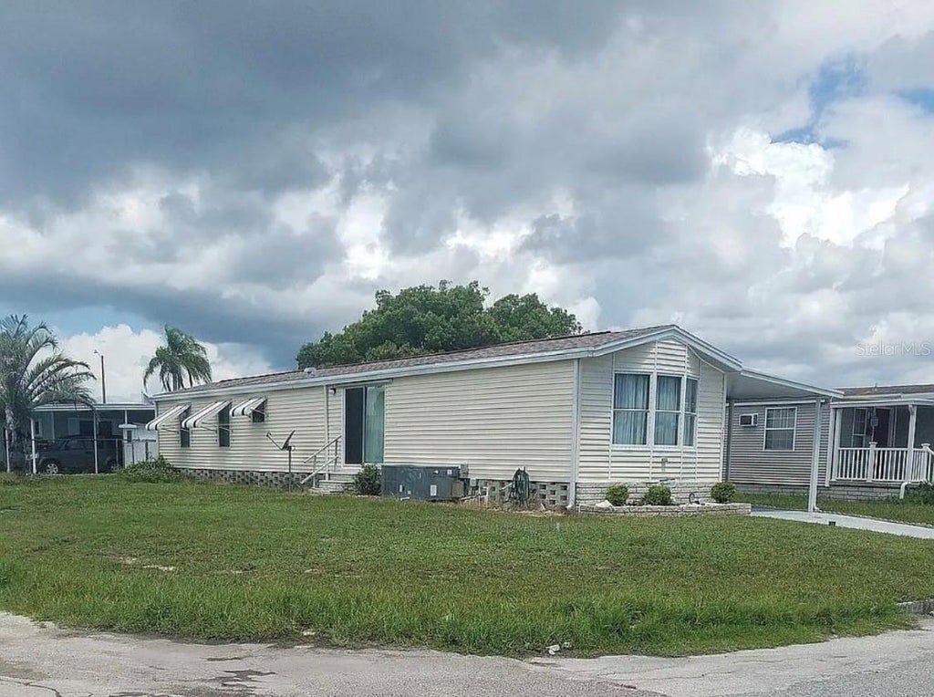 Photo of 2327 Prestige Drive, Holiday, FL 34690 (MLS # J1006046)