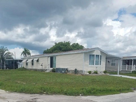 Photo of 2327 Prestige Drive, Holiday, FL 34690 (MLS # J1006046)