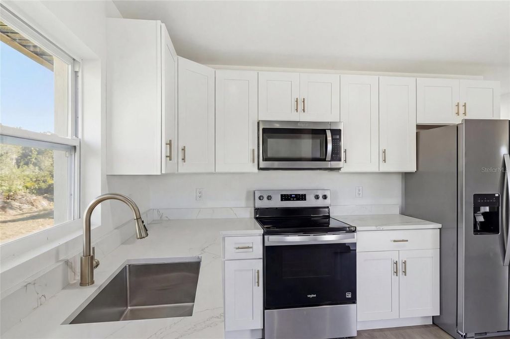 Photo of 5136 Jennings Boulevard, Port Charlotte, FL 33981 (MLS # A4680764)