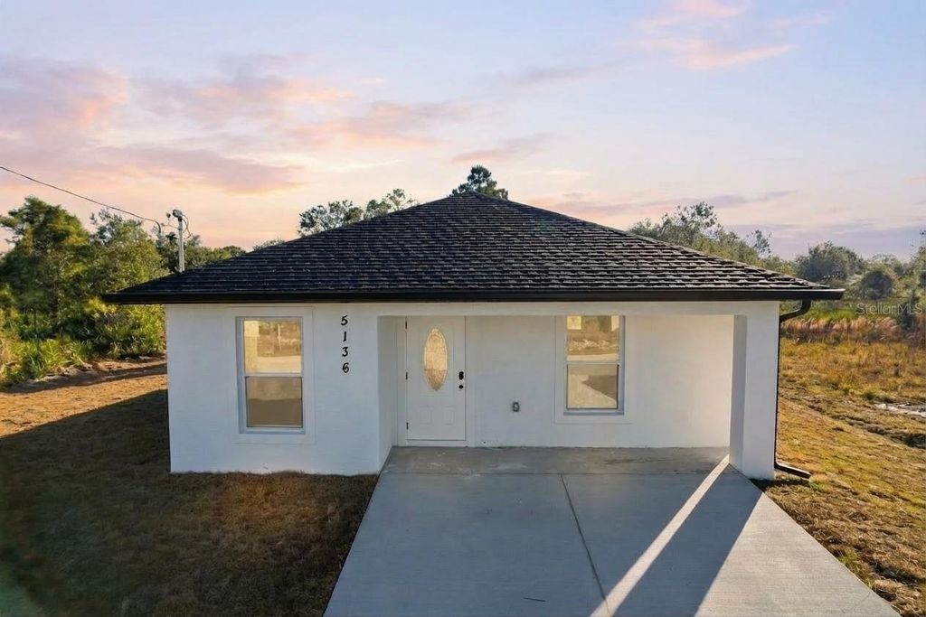 Photo of 5136 Jennings Boulevard, Port Charlotte, FL 33981 (MLS # A4680764)