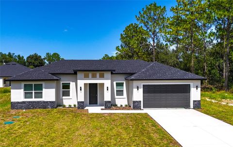 Photo of 151 Marion Oaks Pass, Ocala, FL 34473 (MLS # O6333375)