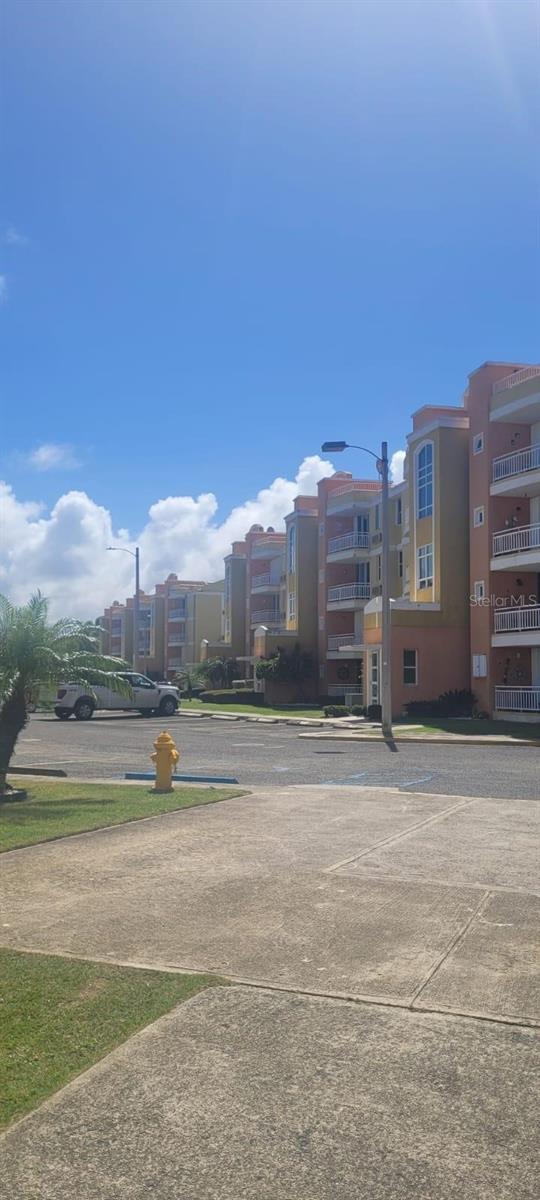 Second floor apartment, 1233 SQ ft (112.269 sq mt) Equipped: stove, refrigerator, and furnished, Living, dining, kitchen, 2 balconies, 3 bedrooms, 2 remodeled bathrooms, all metal and glass doors, storm shutters, 4 inverter air conditioners,5 ceiling fans, screens, laundry room with combo washer/dryer. Amenities' at condo: 2 pools, gym, access to beach, club house, tennis and basketball courts, beach volley ball, 2 assigned parking for the apartment, 33 visitors parking. 24 hr security guard, access control, Air B & B permitted, (short or long term rental) Excellent organized community.