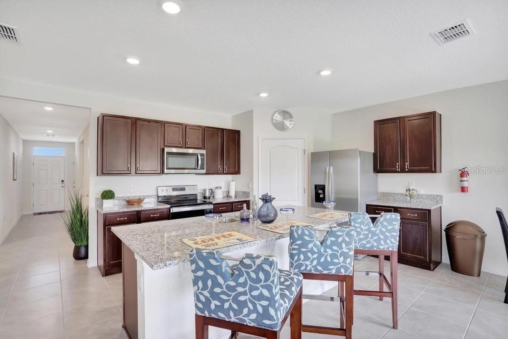 Photo of 937 Cattleman Street, Winter Haven, FL 33881 (MLS # W7886749)
