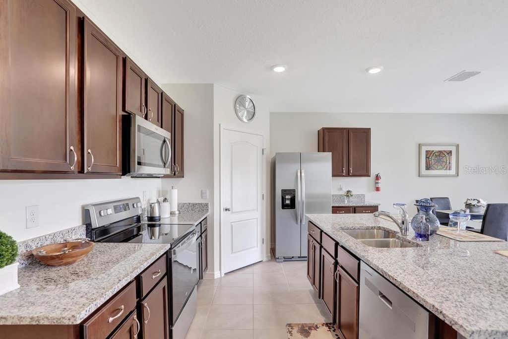 Photo of 937 Cattleman Street, Winter Haven, FL 33881 (MLS # W7886749)