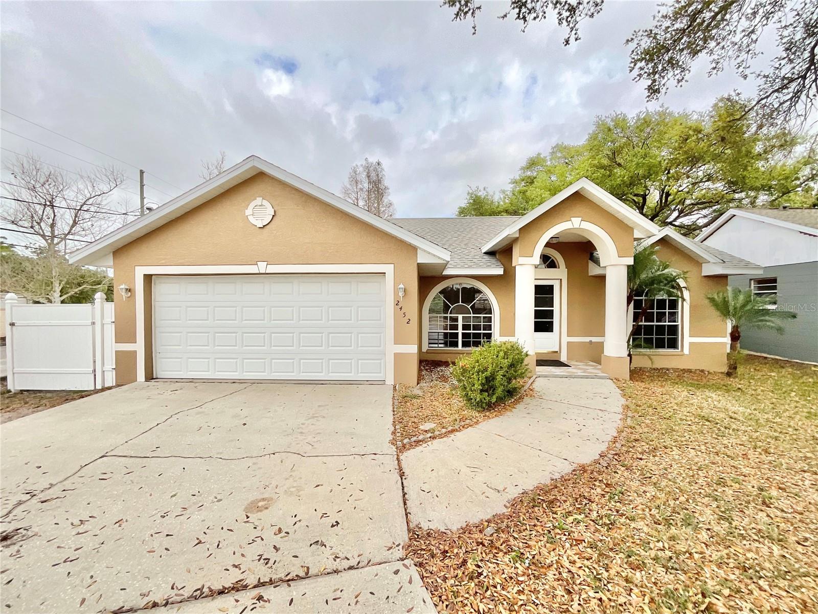 BEAUTIFUL 2001 3 BED 2 BATH 2 CAR GARAGE ALL REMODELED GORGEOUS KITCHEN 2022 WITH TALL WHITE CABINETS, BEAUTIFUL GRANITE A 4FT X 8 FT CENTER ISLAND , ALL TILE FLOORS , NEW BATH VANITIES, PRIVATE FENCED REAR YARD AND NO REAR NEIGHBORS ON ONE SIDE. HIGH CATHEDRAL CEILINGS , LARGE DRIVEWAY AND QUICK ACCESS TO US19N AND SR60 GULF TO BAY TO TAMPA. READY SEPT 1 2025 CAN BE SEEN PRIOR