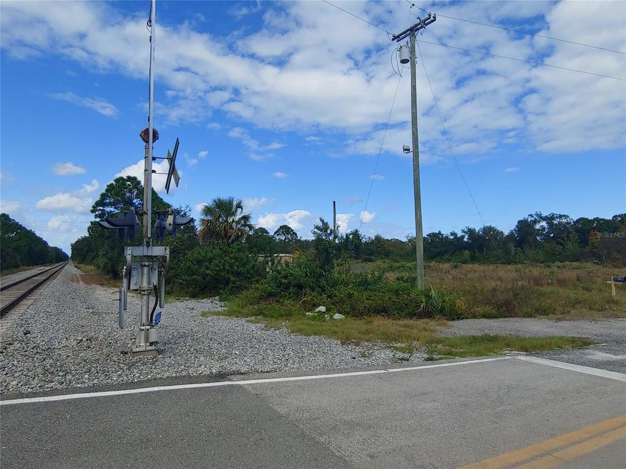 20+ acres directly on Florida East Coast Railway with potential for railroad spur, rezoning, and manufacturing/shipping operation(s). Southern 10.4 acre parcel is currently zoned A-3, northern 10 acre parcel is currently zoned I-2 (heavy industrial), with a total of over 1,900' of railway frontage. There is 377' of frontage on Clinton Cemetery Road to the south and a 60' easement out to US1 from the northeast corner of the property. Boundary survey is available. Listing agent can provide contact information for Edgewater's Senior Planner for any zoning and usage inquiries.; Cleared: Partial ;Water: Available at Site