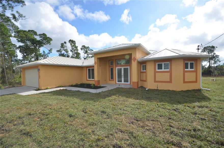 Welcome to your dream home in the heart of Lehigh Acres, FL! This stunning 2601 square foot residence, built in 2024, offers a perfect blend of modern design and functional living. Step inside to discover an expansive open-concept layout that seamlessly connects the living, dining, and kitchen areas, making it ideal for entertaining or simply enjoying your own space. The contemporary kitchen is equipped with top-of-the-line appliances, including a refrigerator, e-range, microwave, and dishwasher, ensuring that culinary adventures are a delight.