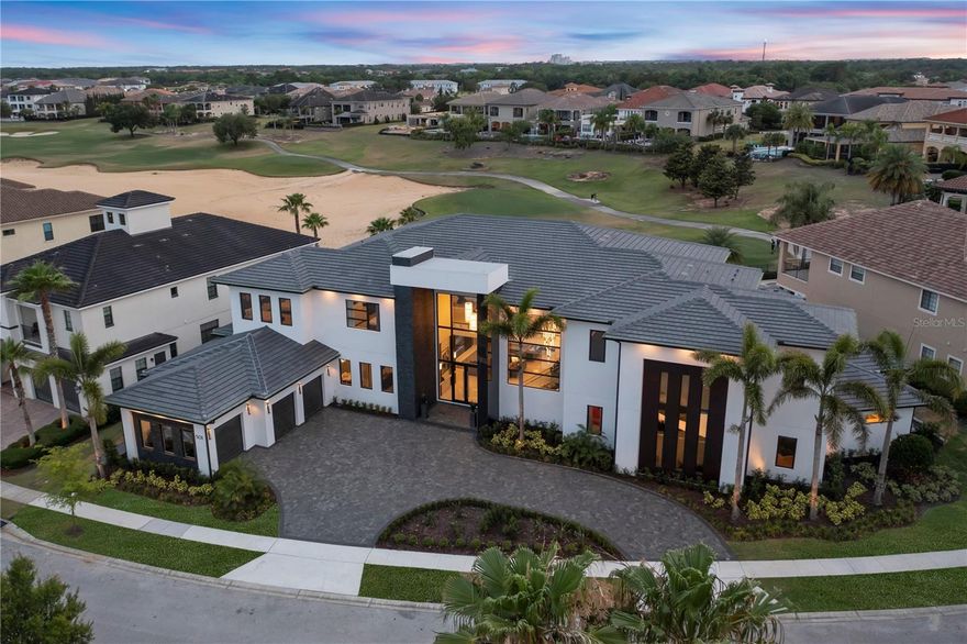 THE MAGICAL MANSION – Dreams do come TRUE.  Welcome to Reunion Resort, and one of the most iconic one-of-a-kind properties in the world.  This 9 bedroom, 11.5 bath, 13,580 total sq ft custom built masterpiece is a playground for all ages.  This Walt Disney World area destination property can also be that special turn-key investment for you and your family.  You won’t need a magic wand to enter this special place, but the towering glass entry way will surely make you feel like royalty. Immediately walking through the glass double doors, you feel like you are in a magical place. The MASSIVE open Florida floor plan is just the start of the adventure.  The lounging space stretches throughout the first-floor entry and draws you through to outside where the amazing 75ft long custom swimming experience and lanai area just steps away.  No reservations needed when gathering the whole family around the oversized 16 seat royal table.  This home boasts one of the LARGEST POOLS in REUNION.  Have your meal prepared in the custom high-end kitchen that is filled with Wolf appliances, a custom Sub-Zero fridge and granite waterfall island.  The home’s first floor continues with 2 master en-suites that are customized designed for your high-end guest experience and two private baths. The formal regal suite, also on the first floor is the glamorous oasis that you are looking for and provides private access to the oversized out-door living space. A private gym and a custom gaming room means there is always an opportunity to carve out some “me” time.  The celebration continues on the first floor at the full-service bar area that is accented by the open-air pass-through service window to the lanai, perfect for those large party get together for even heads of state.  Exploring the home reveals arguably the BEST THEMED ROOM in the world.  Once you see it you will never forget it!  You and your guests will be amazed to Infinity and Beyond! - The TWO-STORY themed room makes you feel like you are on a Pixar movie set and the size of an army man. You catch yourself looking for Buzz and Woody.   A private fireworks show is a button away and the mirror on the wall will make sure “You're the fairest of them all”.   Every detail is meticulously thought out making you feel like a kid again and appreciate this one of kind creation.  This property is like owning your own theme-park. The second floor continues to amaze with four more master suites and themed bedrooms.  2 dozen reclining seats line a private theater room that is set up for private screenings or gathering together to watch a movie on the oversized movie screen.  For others, explore the upstairs bar or oversized balcony that overlooks the pool area and the 14th hole of the Signature Jack Nicklaus golf course.  This homes custom-designed pool is west facing, showcasing a 10-person spill over spa.  The 70+ ft pool is lined with LED lights making the STARS always out at night.  This home is sure to delight and create lasting memories you and your family will share for a lifetime.  One-of-a-kind opportunity which cannot be replicated. Reunion Resort is located just 6 miles from Walt Disney World and centrally located to all the other great entertainment venues in Central Florida. **REUNION RESORT ACTIVE MEMBERSHIP AVAILABLE**