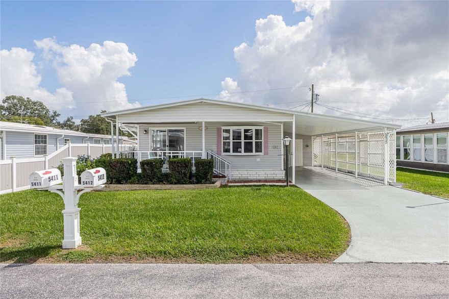 OWN YOUR OWN LAND! Located in Betmar, a 55+ golf community with a low HOA fee of $435.00/year.  This charming home is loaded with extras.  Tastefully designed kitchen with updated subway tile backsplash, countertops, cabinets with undercabinet lighting and newer appliances, a built-in pantry, and breakfast bar all add up to making an enjoyable place for you to cook and entertain. Their is a laundry closet conveniently located just off the kitchen. The dining area is open to living area and kitchen for great traffic flow and the built-in china cabinet and bow window create an inviting atmosphere.  Large living room with laminate flooring has a door wall leading out to a covered cement porch.  The fireplace and wall mounted tv stay with the home. The main bedroom suite has a door leading to a private deck to enjoy your morning coffee or just sit and relax.  There is lots of storage with a walk-in closet in main bedroom and a walk-in closet and a 2nd large closet in the guest room.  Both bathrooms have linen closets and newer ceramic tile on the floor and shower walls.  Home comes partially furnished.  Nicely maintained exterior features vinyl lap siding, metal roof, newer irrigation system, newer vapor barrier, expanded driveway with decorative finished coating, cement flower beds and cement entry steps with handrail.  Vinyl skirting has access to pest controlled ports.  Large 2 part attached utility/work rooms with workbench allow plenty of room for lawn equipment and golf cart.  THE GOLF CART STAYS. The workshop has exhaust fan and roll up door with electric opener.  The HVAC was updated in 2022.  
Also, Betmar offers 27 holes of golf, 2 swimming pools and 2 hot tubs along with 3 clubhouses, a library, walking paths, game rooms (Billiards, Table Tennis, Board Games) miniature golf, enclosed shuffleboard courts, tennis courts, pickle-ball courts, basketball court, Bocce courts, and Bingo.