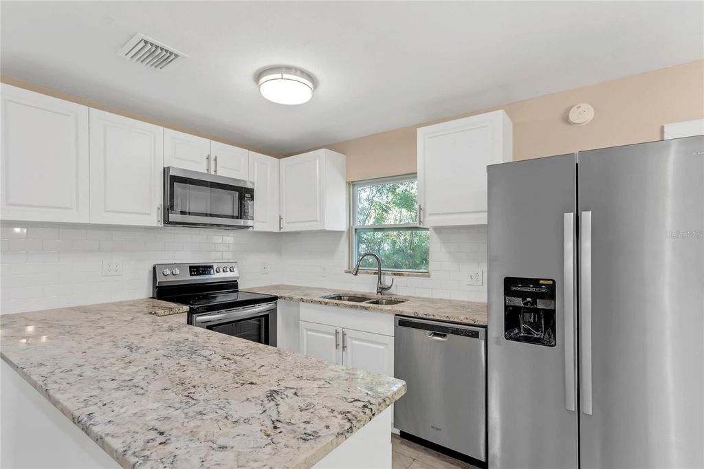 Photo of 235 Adeline B Tinsley Way, Oviedo, FL 32765 (MLS # O6388556)