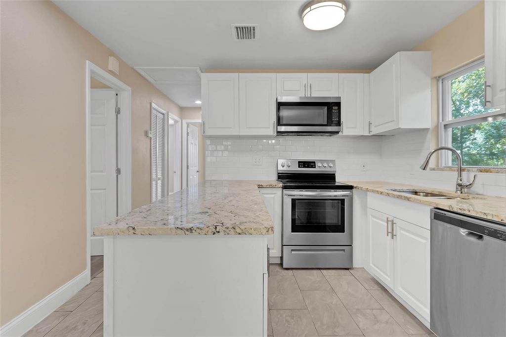 Photo of 235 Adeline B Tinsley Way, Oviedo, FL 32765 (MLS # O6388556)