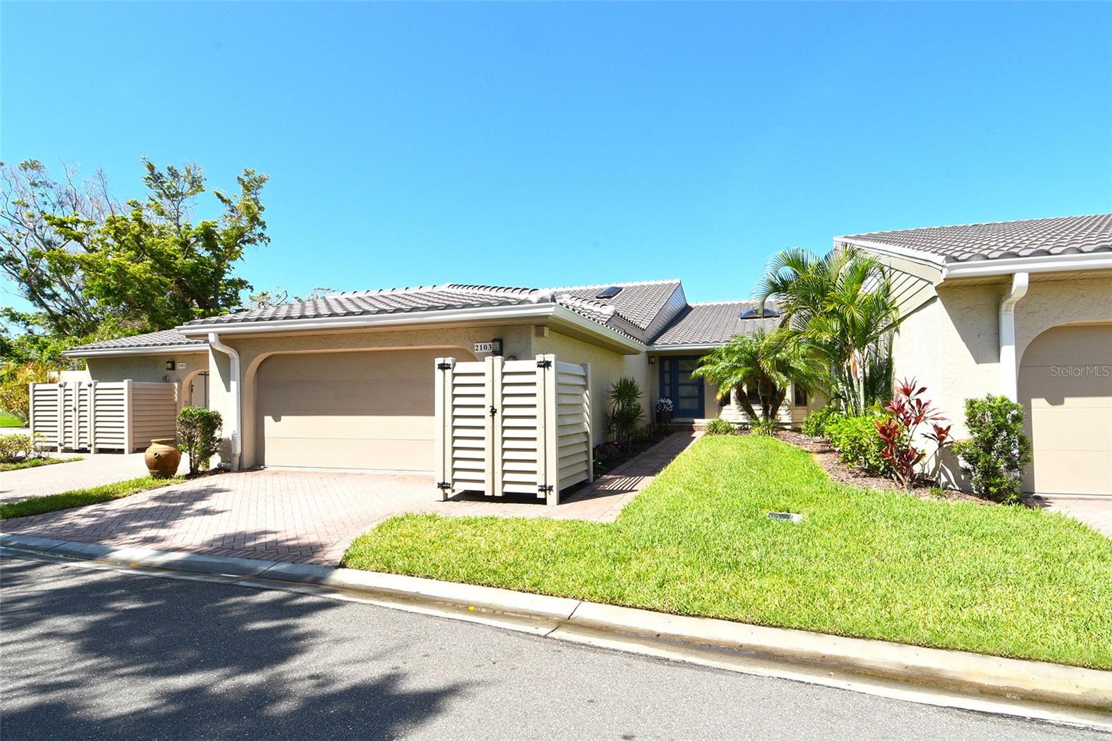 High and Dry, Beautifully Renovated, and Fully Furnished, this Stunning Villa is Move-In Ready! This single-story villa in prestigious Harbour Oaks offers nearly 2,500 square feet of light-filled living space with tasteful finishes and high-end furnishings hand selected by a designer. Elevated over 11 feet, the home remained untouched by flooding or hurricane damage—offering peace of mind in addition to peace and quiet.
In addition to cosmetic upgrades, a new roof (2024) and a new HVAC system (2025), ensures both comfort and long-term value.
A highly desired ground floor unit with no upstairs neighbors, the villa features soaring ceilings, radiant skylights, and expansive golf course views. Over 800 square feet of screened lanai space overlooks the Harbourside Golf Course, creating a tranquil setting for morning coffee or evening entertaining.
Step inside to an elegant formal living and dining area with herringbone-pattern wood-look tile and a striking geometric feature wall. The open layout and stunning floors continues to the rear of the home, where a spacious kitchen-family room offers custom built-ins, a French bistro-inspired bar area with open shelving, a waterfall island, and a sunny breakfast nook. Tucked off the family room is a dedicated half-bath.
The serene primary suite boasts golf course views, generous closet space, and a spa-like bath with dual vanities. Two additional bedrooms at the front of the home share a well-appointed full bath, while a functional laundry room connects to the attached two-car garage.
Harbour Oaks is known for its resort-style amenities, including a heated pool, spa, and beautifully manicured grounds—all just minutes from Longboat Key Town Center. As a resident of Bay Isles, you’ll also enjoy deeded access to the Bay Isles Beach Club, a private Gulf-front retreat with a pavilion, grills, beach loungers, restrooms, and ample parking.
Optional membership to the Longboat Key Club—featuring championship golf, tennis, and Harbourside Moorings deepwater slips—further enhances the exceptional lifestyle offered by this one-of-a-kind property.