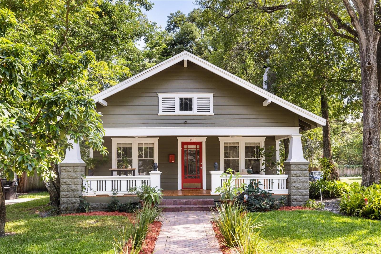 A Rare Craftsman Gem in the Heart of Colonial Town North!
Welcome to 21st-century living wrapped in timeless 20th-century charm. Nestled on an oversized corner lot along a quiet, brick-lined street, this beautifully maintained Craftsman-style property is just a short stroll from Lake Highland Prep and the vibrant dining, shopping, and cultural experiences of the Mills/50 District. This property description includes an unexpected, separated and extraordinary cottage with high wow-factor.
Step onto the wide, covered front porch—complete with new hardwood decking and twin ceiling fans—and into a home where character meets comfort. Inside the main residence, newly refinished hardwood floors flow throughout a warm, light-filled interior featuring two spacious bedrooms and a smaller third bedroom perfect for a home office or nursery. The inviting living room centers around a cozy wood-burning fireplace, while the generous dining room sets the stage for memorable gatherings.
The updated kitchen includes a charming eat-in booth, new refrigerator and dishwasher, and plenty of room for culinary creativity. Outside, the magic continues: an expansive, fully irrigated yard shaded by majestic oak trees, lush landscaping, mature fruit trees—including avocado trees —and a brand-new, show-stopping deck. This outdoor sanctuary features automatic low-voltage lighting, built-in underlit bench seating, and café string lights that transform the backyard into an enchanting evening retreat.
At the rear of the property, a beautifully designed 1-bed, 1-bath guest home offers exceptional flexibility—ideal as an income-producing ADU, private MIL suite, or additional space for entertaining. Thoughtfully designed to maximize every inch, it boasts a full kitchen, in-unit washer/dryer, sleek under/over-cabinet lighting, and all appliances are included.
With a new roof (2021), two newer water heaters, updated appliances, and a large storage shed, this is a move-in-ready opportunity that rarely comes along.
Whether you're looking for multi-generational living, income potential, or simply a unique slice of Orlando history with all the right updates, this home truly has it all.