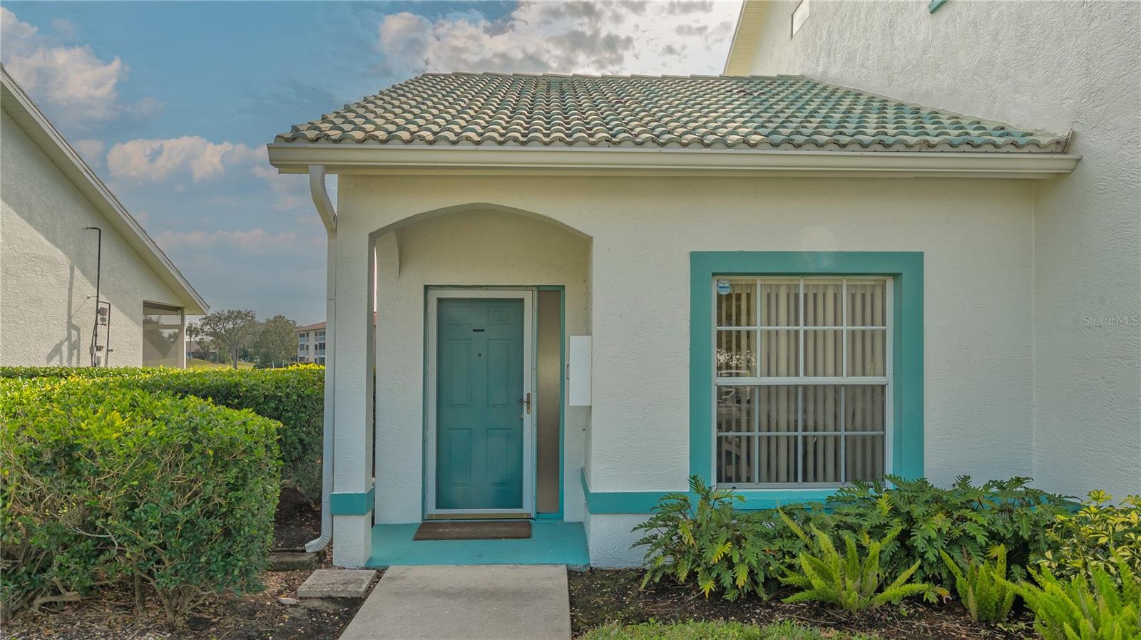 Ready to book season 2026, 3-month minimum! Condo overlooking Water and the Golf Course! Relax on the spacious lanai. First Floor End Unit that has been beautifully maintained. Vaulted ceiling in the Living Room which adjoins to the Dining Area for an open concept. Kitchen overlooks the Living Room to be able to enjoy Company while you prepare the food solid surface countertops, ceramic tile, and eating space in there as well! The attached Garage is located off the Kitchen for convenience and has plenty of storage availability. The Walk-in Closet has plenty of space. There are dual sinks and a walk-in shower in the primary bedroom. Have guests in the second Bedroom, along with the second bathroom. All of this is located in the wonderful Tara Golf & CC Community. You will love having the Class "A" Membership with one time transfer fee of $400, as you will have access to all of the Amenities of the Community! Community offers amenities galore including an exercise facility with state of the art equipment, lap pool, hot tub, concession stand, tennis courts, Championship 18 hole golf course, Clubhouse with fine dining and grill room, pro-shop, driving range, putting green, pickle ball, bocce ball, firepit, and a very active social membership. Centrally located with easy access to I-75, shopping, dining, with a short drive to Sarasota/Bradenton International Airport, UTC Mall, Ringling Museum, downtown Sarasota, and some of the most beautiful beaches Southwestern Florida has! It is a Complete Package! Conveniently located to I-75 for Shopping and Restaurants in the UTC area.