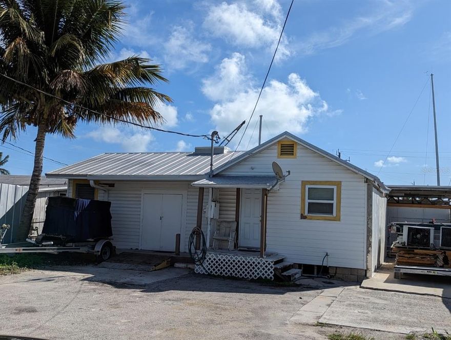 If you have always wanted a place in the Keys to start that fishing business here is your opportunity.  Fantastically situated on a canal with everything you need to get the ball rolling even walk-in coolers. This is an excellent opportunity to start a fishing charter company / Sunset Cruse / Sightseeing .... BECOME World famous for selling everything outdoors sports enthusiasts, anglers, and beach lovers need to enjoy our beautiful waterways, the numerous nearby islands, outstanding beaches, and world class sport fishing. The property located just blocks from the ever-popular restaurant/retail districts off the main artery is 1,068sf with a small 1-bedroom apartment and two full baths. Around the area "The docks" are a draw due to its reputation of having the bait for the fishing charter fleets, private anglers, and the like dating back 50+ years and this is one of the more popular areas to visit for both tourists and locals alike.
****THIS IS NO ORDINARY BUSINESS OPPORTUNITY OR ORDINARY PIECE OF COMMERCIAL REAL ESTATE!
**The property is uniquely located a few blocks back from the main drag just off 15th Street on a water-view lot. 
On average, millions of vehicles per year pass on the way to the water and beaches, and many stop to do business here in the area.  Make your business the reason they STOP.
**World-famous Beaches, Island Hopping and so much more are all are around you.  This would be the perfect spot for a business to support four out of five of the top outdoor activities that draw visitors to the area: fishing, beach activities, water sports, and bicycling. And, if you keep traveling south you're bound to run into the tourist mecca of Key West.
**A world-class fishing destination, our area is famous for its fabulous inshore, offshore, and flats fishing.
There are several large marinas nearby, with hundreds of boats devoted to inshore and offshore fishing. One of the largest Marinas is just across the street from our location, and the boaters and anglers there could be some of your best customers. The Florida Keys draws millions of visitors every year from all over Florida, the US, Canada, and other countries around the world.

 NOT PART OF THE LISTING is a 27' Ballyhoo boat (a five BOX boat) and all the equipment. Call for info.