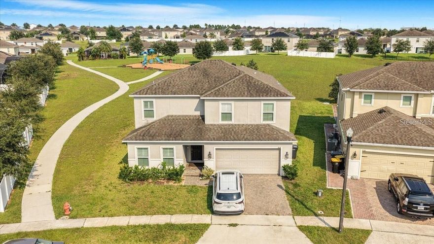 Discover refined elegance in this 2018-built 6-bedroom, 4.5-bathroom residence in Davenport's coveted Laurel Estates. Spanning over 3,500 sq ft, this two-story home boasts an open-concept layout with a gourmet kitchen: expansive island seating six, solid-surface counters, and stainless appliances. Main-floor guest suites with en-suite baths, ceramic tile throughout common areas, and carpeted bedrooms ensure comfort and durability. Upstairs, a versatile loft adapts to your needs, while generous bedrooms feature walk-in closets. Relax on the covered patio near the community playground. Pet-friendly, minutes from highways, shopping, dining, and Orlando attractions—ideal family haven.