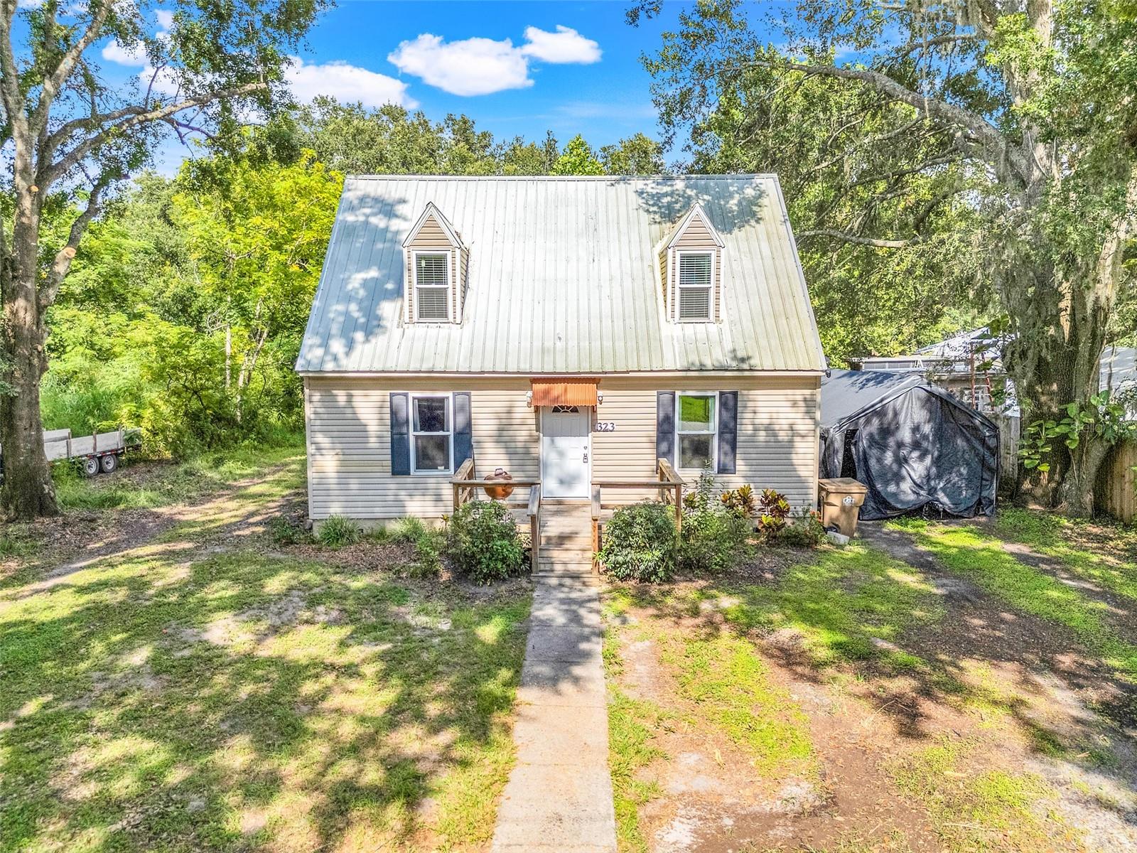 Welcome to this charming, move-in ready home where every detail has been thoughtfully updated. Picture yourself unwinding on the deck, surrounded by peace and privacy—your own quiet retreat.
Inside, you'll find a meticulously maintained living space and a beautifully remodeled kitchen featuring classic shaker cabinets, granite countertops, and updated finishes. Durable, wood-look laminate flooring flows through the main areas, while carpeting adds comfort to the bedrooms. Ceiling fans in every room—an essential for Florida living—keep things cool and comfortable.
Energy-efficient Pella windows add long-term value and year-round comfort. Step outside to a spacious backyard, perfect for entertaining, gardening, or relaxing. A private shed provides flexible space for storage, hobbies, or a workshop.
The lot also offers a clean slate for future garage and driveway plans. With no HOA and a prime location close to shopping, schools, and athletic fields, this home truly offers it all.
Don’t miss your chance to tour this hidden gem—you’ll be glad you did!