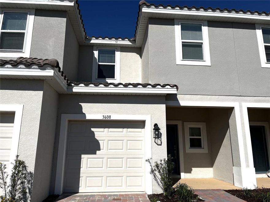 Welcome to this brand-new 2023 townhome, 24/7 guard-gated Bellalago community. Bellalago is a resort-style community offering a tranquil and distinctive way of life. This exquisite townhouse, 3 bedrooms, 2.5 bathrooms with first floor is all in tiles, and the second floor all in carpet. A single-car garage but tha unit has an elongated driveway that fits 3 more vehicles. The spacious open design concept, seamlessly flowing into a well-appointed kitchen with quartz countertops, a central quartz island, and a large walk-in pantry. Inside of the home you will find brand-new stainless-steel appliances in the kitchen, as well as a brand-new set of washer and dryer. Upstairs, discover 3 bedrooms, with the master bedroom offering a walk-in closet and an ample double-sink bathroom. The home is also equipped with a Ring Video Doorbell, smart door lock, and smart thermostat. Bellalago offers state-of-the-art amenities: an Olympic-sized swimming pool, water slide pools, fitness classes (Zumba, Yoga), tennis and basketball courts, fishing, walking and biking trails, and more. Grocery stores, restaurants, and a community college are conveniently close, with Disney Theme Parks just 30 minutes away. No smoking indoors. Lawn care and access to amenities or fitness classes included in rent. HOA approval required. Move-in Ready today and NO PETS please.