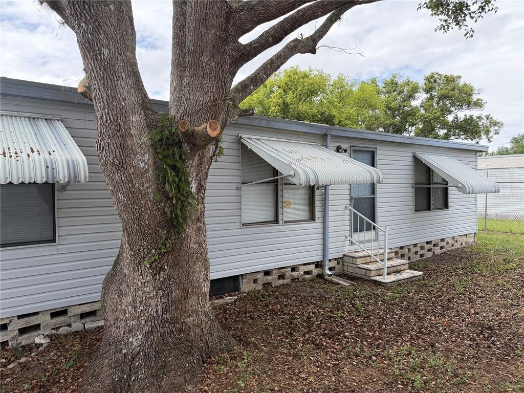 Photo of 34321 Countryside Drive, Wesley Chapel, FL 33543 (MLS # W7884773)