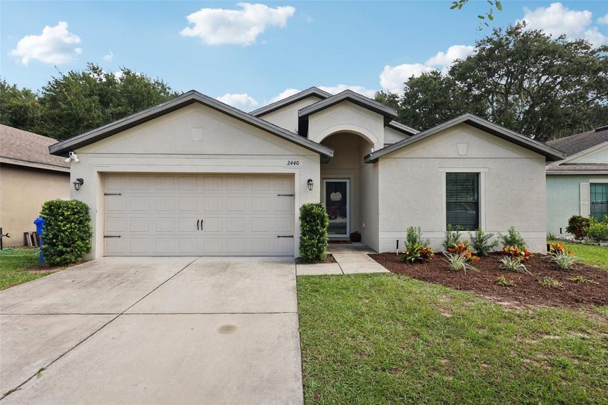 Welcome to 2440 Bracknell Forest Trail — a lovingly maintained 3-bedroom, 2-bath traditional home offering 1,629 square feet of comfortable living in a desirable Lake County location. Nestled on a 0.14-acre lot with a fully fenced backyard, this home offers privacy, functionality, and proximity to some of Central Florida’s most charming communities.
Step inside to find an open-concept floor plan designed for both everyday living and entertaining. The spacious living room flows seamlessly into the dining area and kitchen, featuring warm wood cabinetry, modern appliances, and expansive counter space — perfect for preparing meals and gathering with loved ones. The newer flooring adds a clean, modern touch to the heart of the home.
All three bedrooms are well-sized, including a private primary suite with a full bath. Enjoy peace of mind with a recently updated A/C system (just 1 year old) and a layout that maximizes comfort and convenience.
Step outside to your covered patio and fenced backyard — ideal for outdoor grilling, letting pets roam freely, or creating a garden oasis.
Location is everything, and this property delivers. You're just minutes from Downtown Tavares, known as America’s Seaplane City, where waterfront dining, boating, and aviation charm abound. Just a short drive away, Downtown Mount Dora offers year-round festivals, boutique shopping, and exceptional restaurants.
Whether you're a first-time buyer, downsizing, or relocating to enjoy the Florida lifestyle, this home checks all the boxes.
Don’t miss this move-in-ready gem — schedule your private showing today!