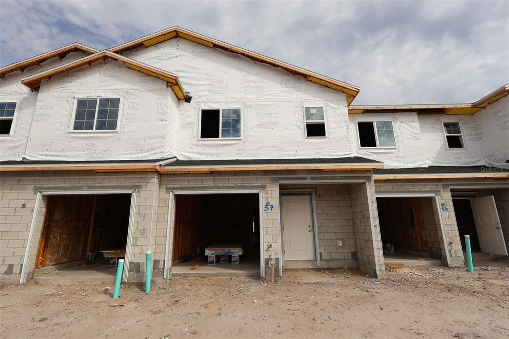 Photo of 6063 Fellow Wagon Way, Orlando, FL 32822 (MLS # O6446834)
